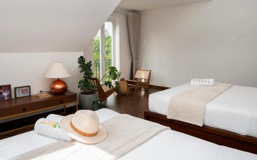 Katil atau katil-katil dalam bilik di Homestay Interconnection Ba Vì - Hà Nội