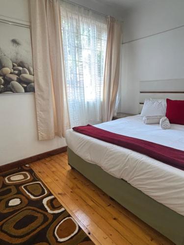 Cama o camas de una habitación en Frere Hill Guesthouse