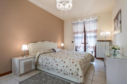 Un pat sau paturi într-o cameră la Casa Allegra