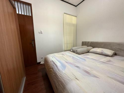 Cama o camas de una habitación en Puri Sagan