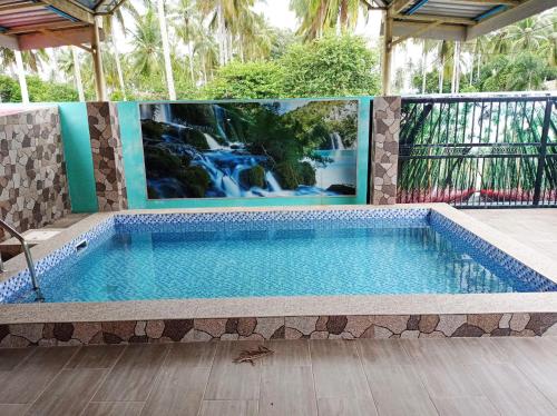 Swimmingpoolen hos eller tæt på ADA Homestay Senak