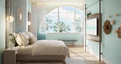 Letto o letti in una camera di Beaches Turks and Caicos Resort Villages and Spa All Inclusive