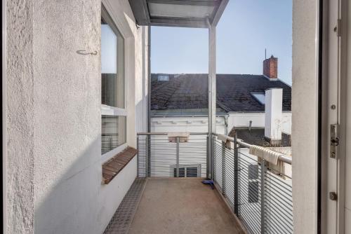 a balcony with a view of a building at Altstadt Residenz in Lübeck