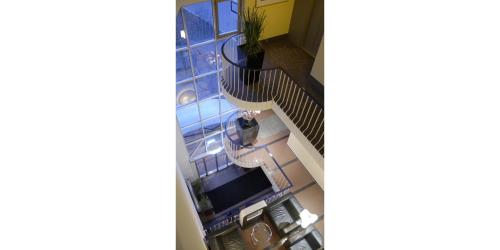 an overhead view of a kitchen and stairs in a apartment at Hotel am Stadtgarten in Radolfzell am Bodensee