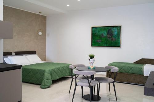 Postel nebo postele na pokoji v ubytování Pietra Viva Suite e Relax