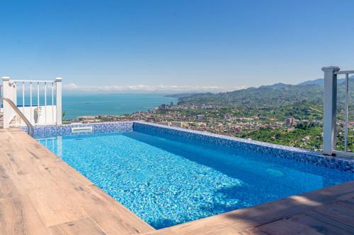La alberca dentro o cerca de GOLDEN SUNSET BATUMI, VILLA WITH PANORAMIC VIEW AND INFINITI POOLs
