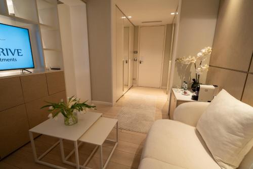 Μια τηλεόραση ή/και κέντρο ψυχαγωγίας στο Lake Drive Rooms&Apartments