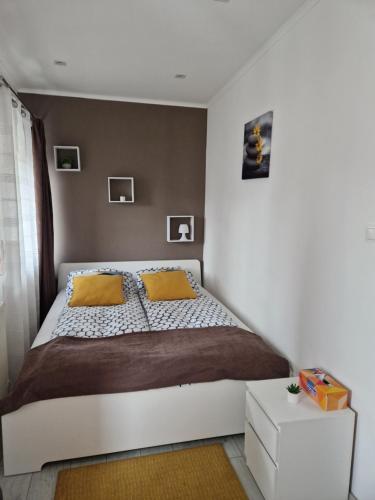 Postel nebo postele na pokoji v ubytování Rákóczi apartman