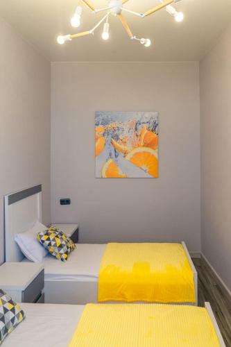 Una cama o camas en una habitación de GOLDEN SUNSET BATUMI, VILLA WITH PANORAMIC VIEW AND INFINITI POOLs