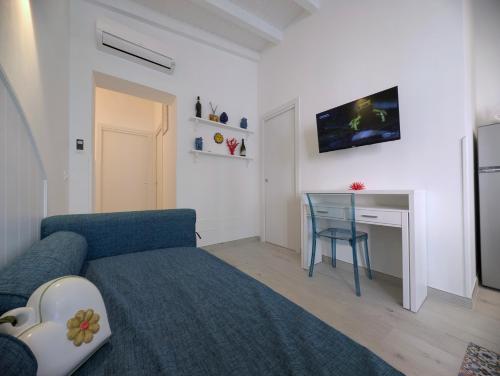TV a/nebo společenská místnost v ubytování Casa D'Amore Lipari