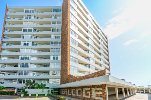 a rendering of a tall apartment building at Unit 62 Sealodge Umhlanga Beach in Durban