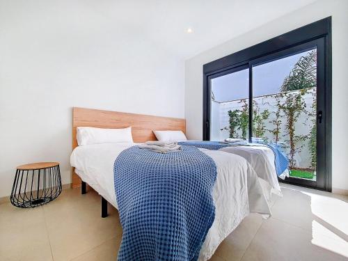Ένα ή περισσότερα κρεβάτια σε δωμάτιο στο San Javier Villa with Pool - 4810