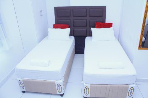 Katil atau katil-katil dalam bilik di 4 Callington Guest house