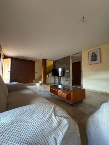 Una cama o camas en una habitación de Anosa