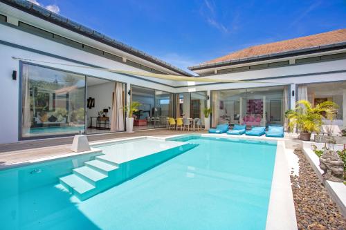an image of a swimming pool in a house at Luxury 4BR Villa Virginie, Salt Pool, Rawai in Rawai Beach