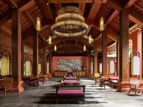 a rendering of the lobby of a resort with a chandelier at InterContinental Xishuangbanna Resort by IHG in Jinghong