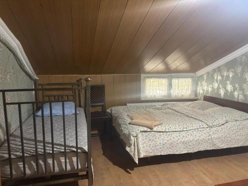 Postel nebo postele na pokoji v ubytování Tina's Homestay