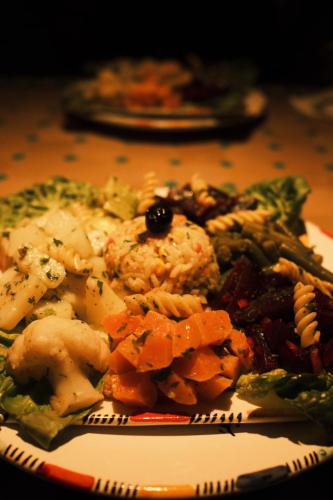 a plate of food with vegetables on a table at Villa AMMA in Essaouira
