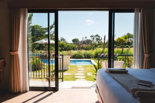 Πισίνα στο ή κοντά στο Padi Villa Canggu