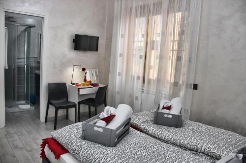 Posteľ alebo postele v izbe v ubytovaní B&B J&B