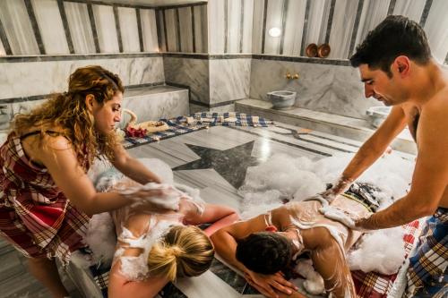 a group of people bathing in a bath tub at Bieno Venüs Hotel - All Inclusive in Side