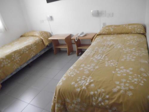 Postel nebo postele na pokoji v ubytování Rukalhue