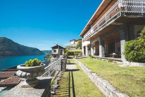 a house with a view of the water at Luce del lago in Moltrasio