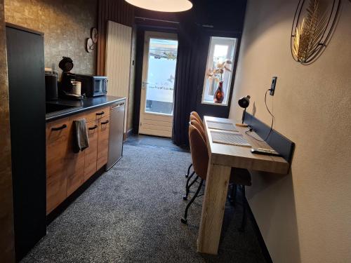 Kuchyň nebo kuchyňský kout v ubytování B&B de Droomgaard