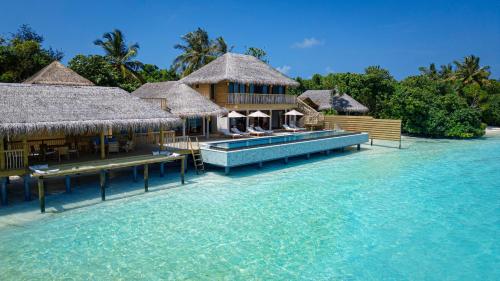 a villa on the water in the maldives at Six Senses Laamu in Laamu