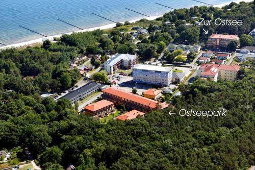 an overhead view of a city with trees and the ocean at Zempin Ostseepark WE 10 _Insel Use in Zempin