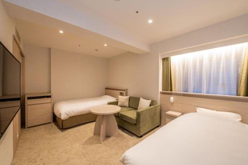Una cama o camas en una habitación de Richmond Hotel Sendai - Reopened After Renovation on 28 Dec 2024