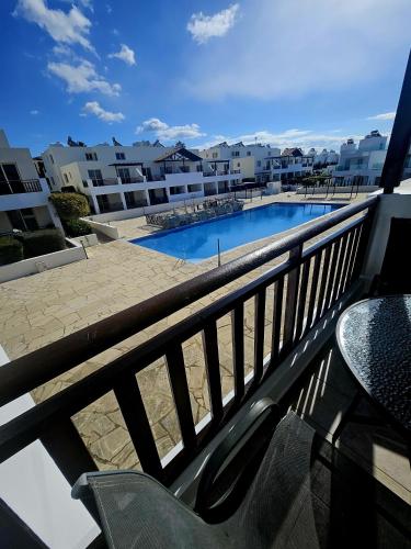 Pool view studio, shaded balcony