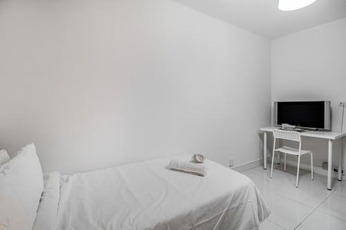 TV a/nebo společenská místnost v ubytování Las Palmas Comfort Rooms