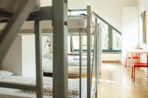 Postel nebo postele na pokoji v ubytování Cukrarna Guest Accommodation