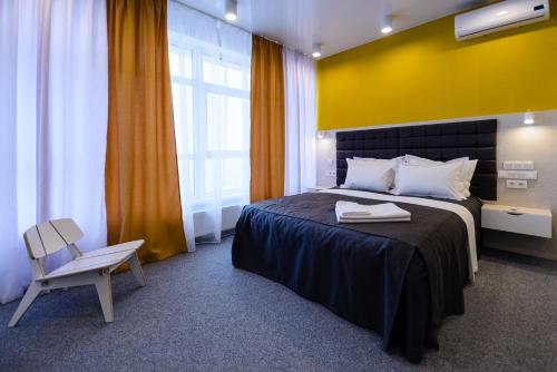 Postel nebo postele na pokoji v ubytování Partner Guest House Klovs'kyi