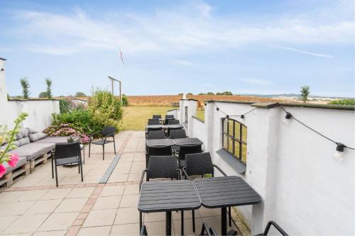 En balkon eller terrasse på Ellevilde Boutique Hotel