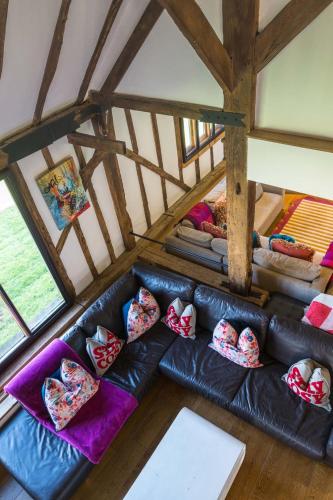 Ένα ή περισσότερα κρεβάτια σε δωμάτιο στο Luxury, countryside barn conversion with Hot tub & Sauna