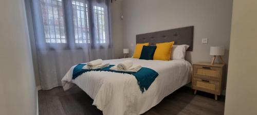 Letto o letti in una camera di Torrejón Suites 2 habitaciones