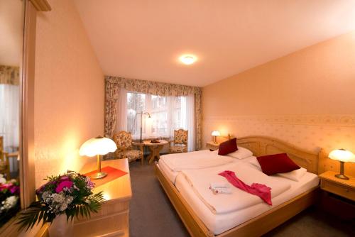 Postel nebo postele na pokoji v ubytování Hotel Heikenberg