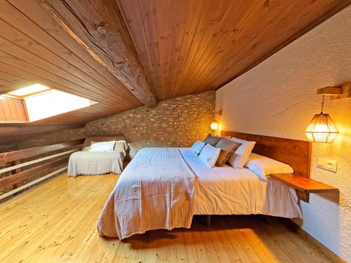 Postel nebo postele na pokoji v ubytování Hotel Cal Rei de Talló