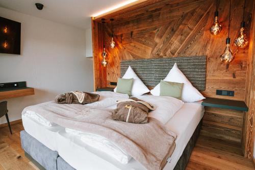 Postel nebo postele na pokoji v ubytování Wohlfühlhotel zur Post