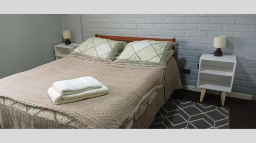 Ένα ή περισσότερα κρεβάτια σε δωμάτιο στο Hospedaje Valdes