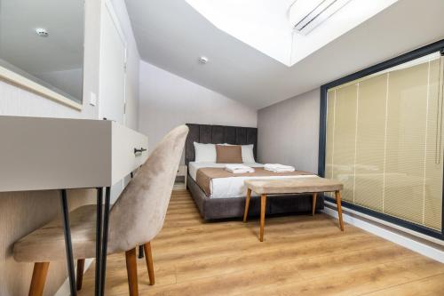 Ένα ή περισσότερα κρεβάτια σε δωμάτιο στο Luxury Life Suites