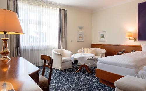 Posezení v ubytování RomanticHOTEL Goldener Karpfen
