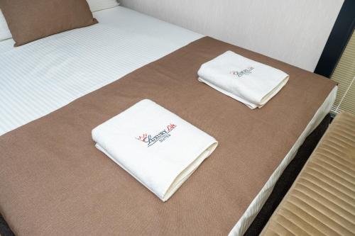 Ένα ή περισσότερα κρεβάτια σε δωμάτιο στο Luxury Life Suites