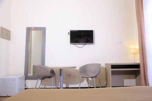 Télévision ou salle de divertissement dans l'établissement Venetian Hotel