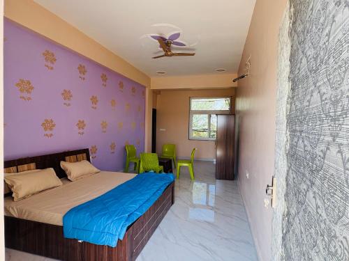 Postel nebo postele na pokoji v ubytování Hotel Rainbow Water park and Garden Restaurant