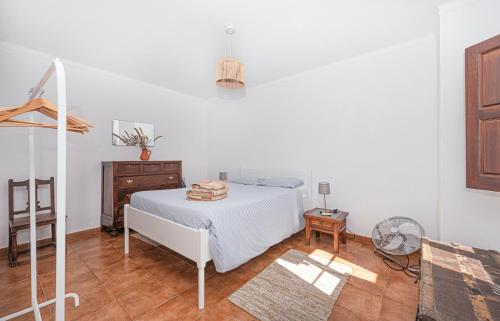 Ένα ή περισσότερα κρεβάτια σε δωμάτιο στο Pátio Sant'Ana - 2 bedrooms villa w/ exterior area