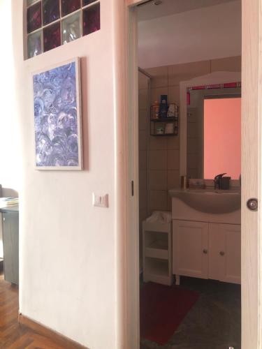 a bathroom with a sink and a mirror at B&B Vista Mare in Naples