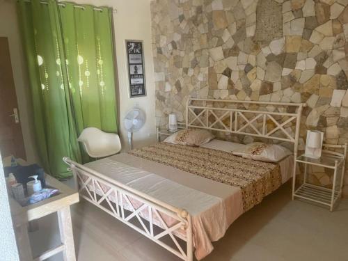 Una cama o camas en una habitación de Villa Bou Rafet avec vue sur mer